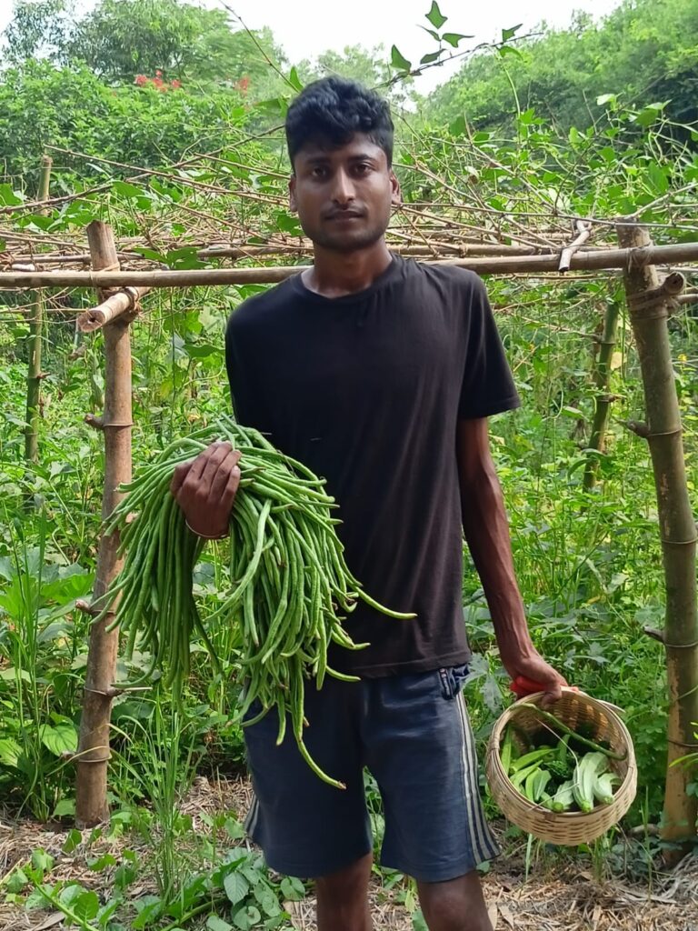 Suvendhu Standing with vegetables in hand